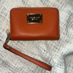 MK wallet with removable wristlet strap in very good condition